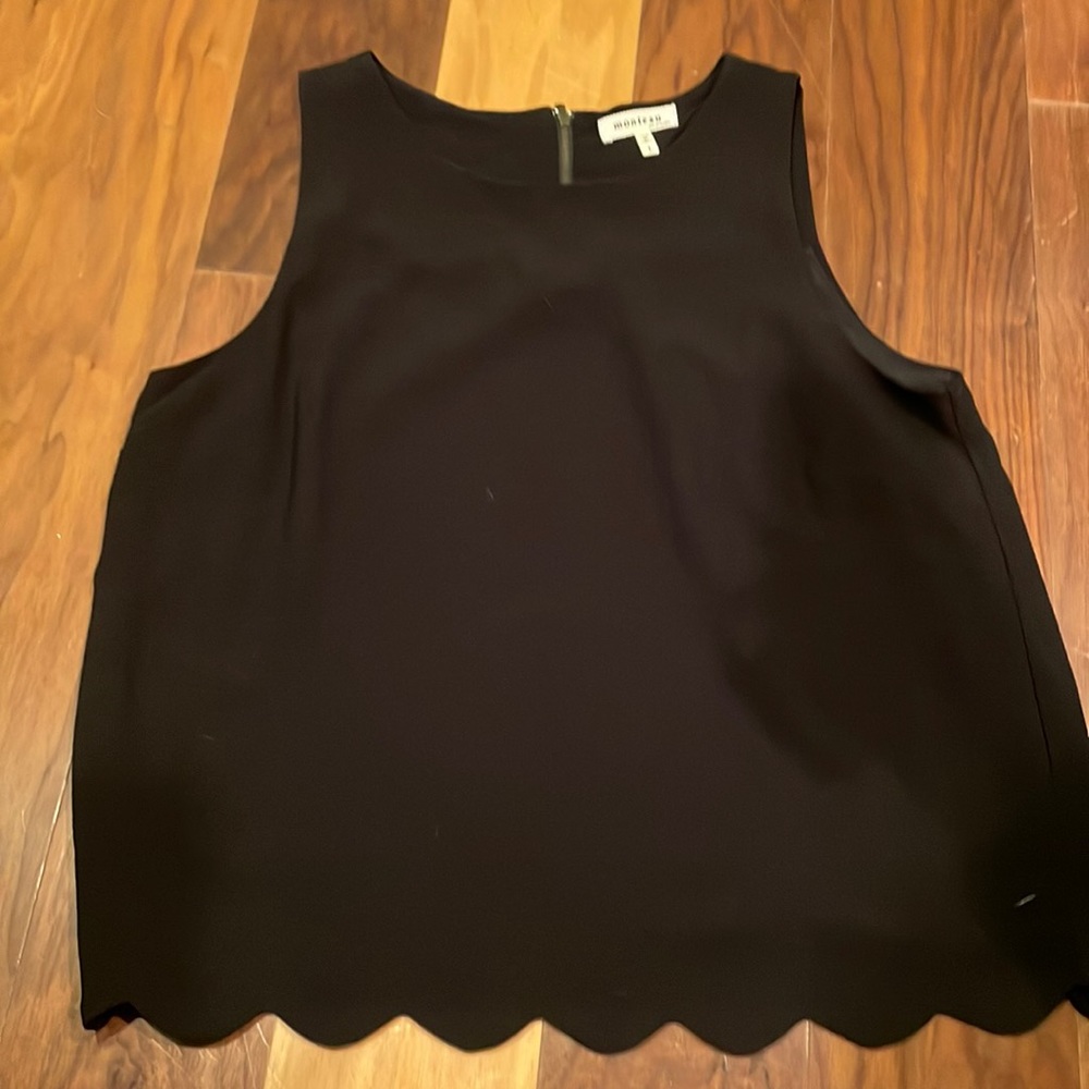 Black tank with ruffled bottom hem